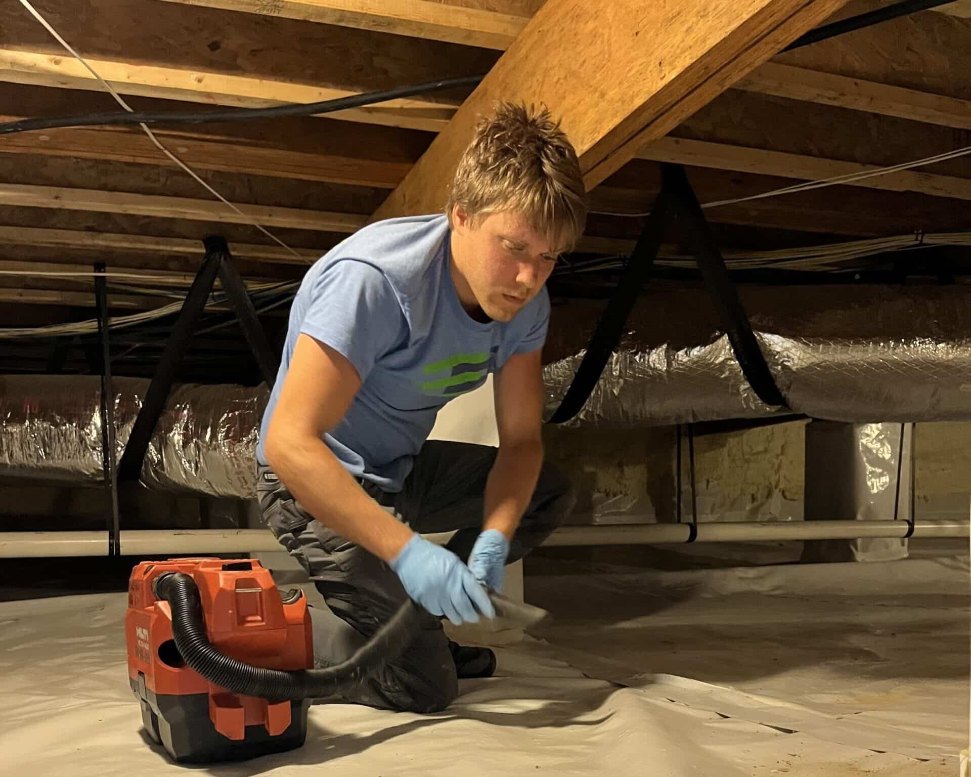 Maintenance - Crawlspace Cleaning E3 Innovate Team Working In Encapsulated Crawl Space